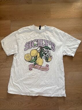 Divided White Graphic Tee with Yellow Lemon Print